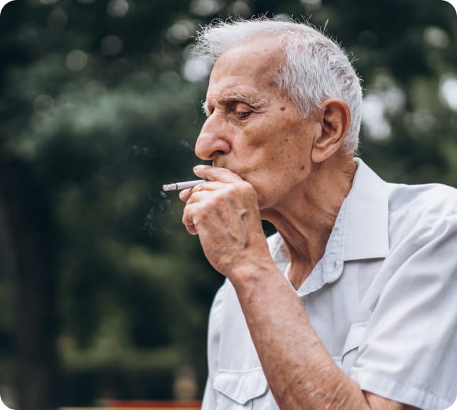 Older adult outdoors representing age and lifestyle risk factors for eye health.